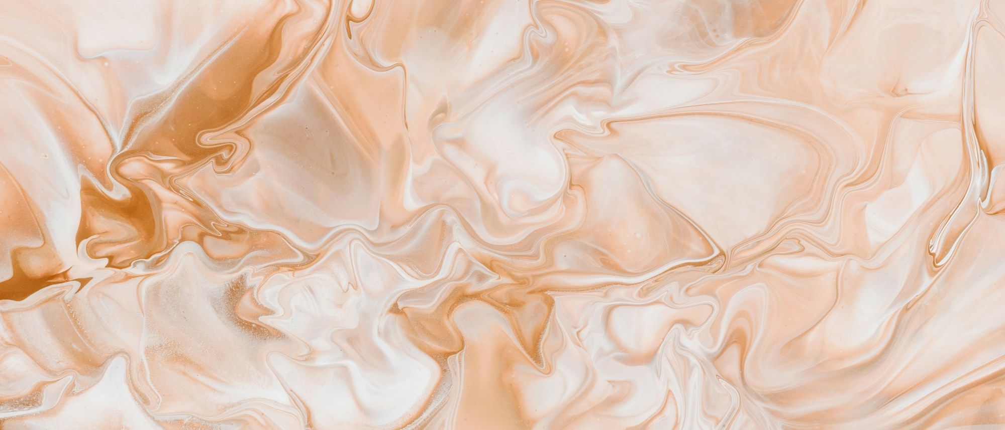 Peach and tan marbled texture
